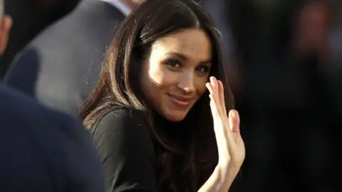 Getty Images Meghan Markle waving
