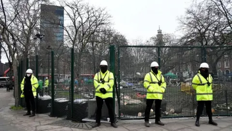 Reuters Security at protest camp