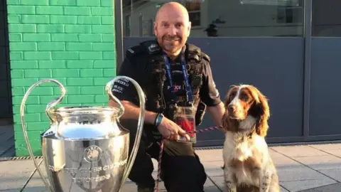 South Wales Police Police officer and dog