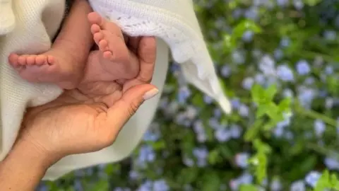 PA Duchess of Sussex and son's feet