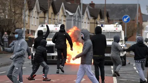 Charles McQuillan/Getty Images Petrol bombs were thrown at police