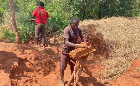 People making bricks