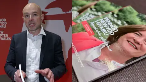 This picture is split in half, on the left side there is a man in a black suit with a white shirt is stood in front of a red wall with white lettering and logo. On the right hand side is a picture of the First Minister spread on a manifesto cover for Welsh Labour, the background on the manifesto cover has green bushes, grass and white flowers.