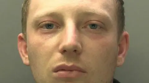 Thomas Morgan mugshot, looking to camera