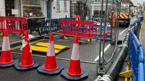 Julia Gregory/BBC Cones and barriers seal off West Street for repair work to get underway by engineers 