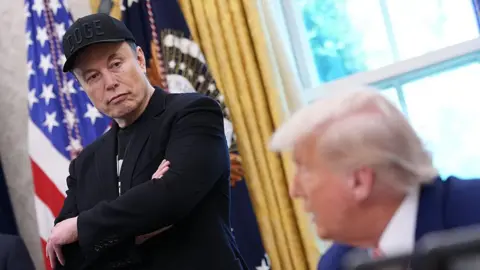Elon Musk pictured with Donald Trump in the Oval Office