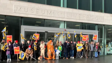 workers on strike outside the Museum of Liverpool