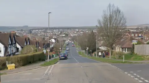 A Google Street picture looking down a road.