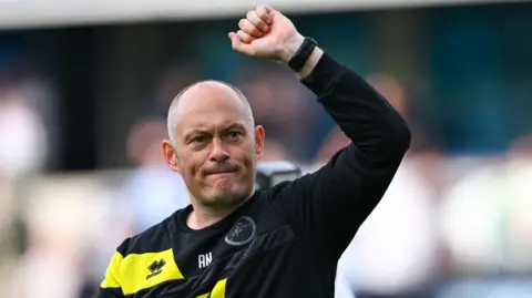 Manager Alex Neil salutes Millwall fans