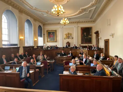 BBC The 40 members of the States of Guernsey