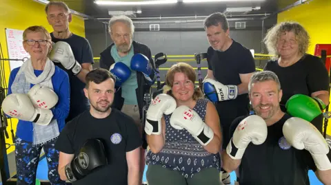 A group of people in a boxing gym in Newquay