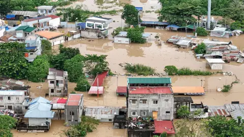 Getty Images This photo shows an aerial view of flooded houses in Tuguegarao City,