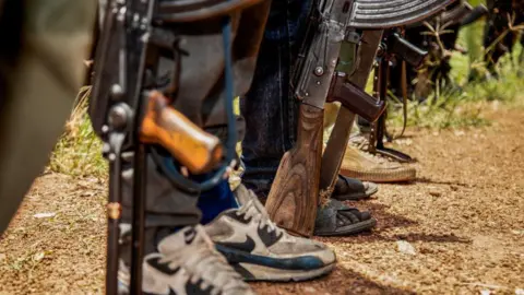 Rebels of the Sudan People's Liberation Movement-in-Opposition (SPLM-IO), a South Sudanese anti-government force, take part in a military exercise