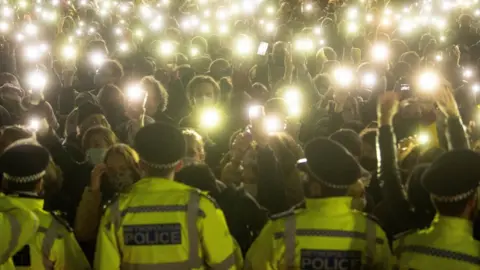 PA Media Police attend a vigil for Sarah Everard on Clapham Common in March 2021