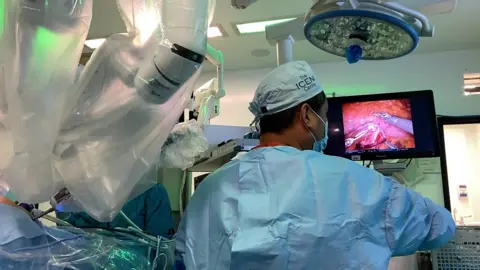 The system allows doctors to operate tools remotely with great precision during procedures.