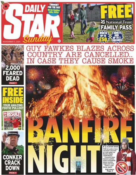 The Daily Star Sunday front page. The headline reads: 'Banfire night' with an image of fireworks exploding behind a bonfire. There's also a sad looking man with a sparkler. 