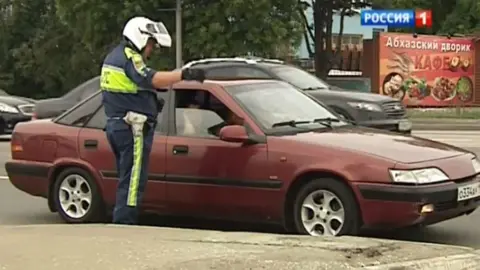 Rossiya-1 TV A traffic warden in Moscow