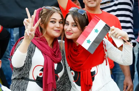 EPA Fans of Syria pose during the FIFA World Cup 2018 qualifying soccer match between Iran and Syria at the Azadi stadium in Tehran, Iran, 5 September 2017