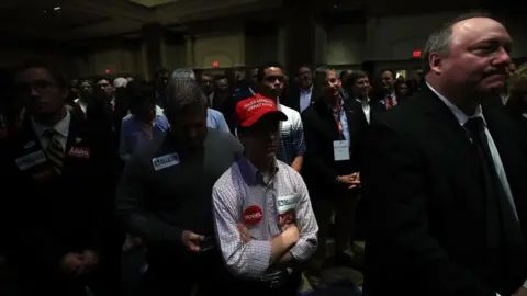 Getty Images Gillespie supporters watch results come in at an event in Richmond