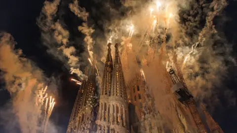 View of the fireworks for the inauguration of Jesus Christ tower by Pope Leo XIV at the Basílica de la Sagrada Família