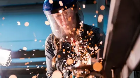 Getty Images worker in factory