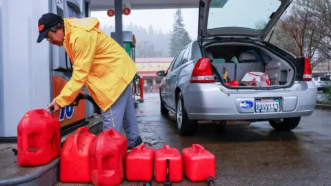 Reuters A man stockpiling gasoline