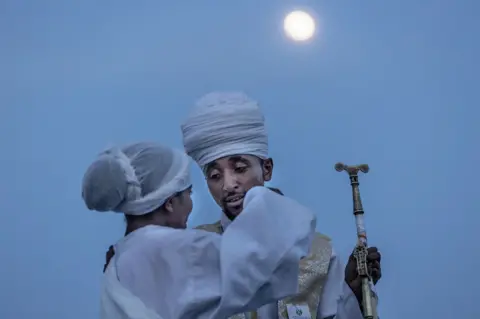 Amanuel Sileshi/AFP Orthodox deacons talk during the celebrations of the Orthodox holiday of Meskel in Addis Ababa, Ethiopia - Wednesday 27 September 2023