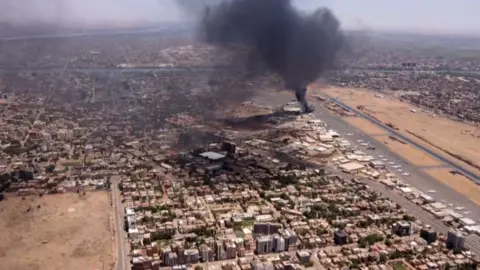 AFP Smoke rising into the skyline