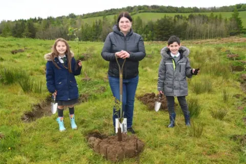 Woodland Trust Susan Aitken tree planting with children