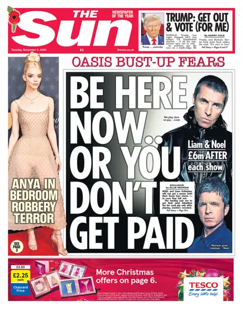 The headline on the front page of the Sun reads: "Be here now or you don't get paid" 