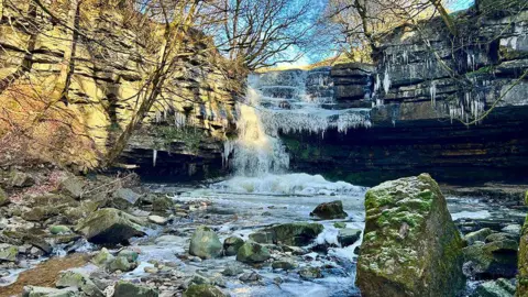 BBC Weather Watchers/Ajax S A waterfall is frozen in motion in County Durham