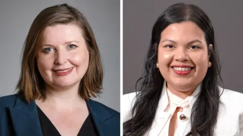 A composite image of two politicians side by side. The politician on the left is a brunette woman with a side fringe, a blue blazer and is smiling directly at the camera. The politician on the right has long dark hair, is wearing a white shirt and is also smiling at the camera. 