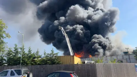 John Fairhall/BBC The fire at Sackers in Great Blakenham