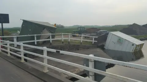 Lancashire Police JCB in canal