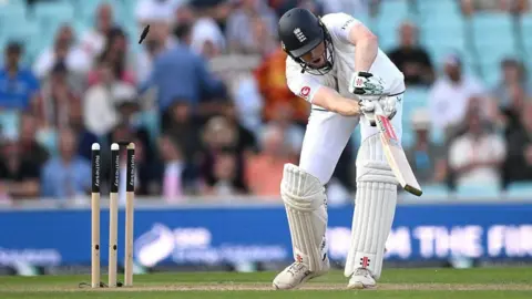 Zak Crawley is bowled by Mohammed Siraj