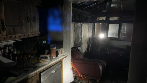 Image of a kitchen that has been left burnt after a fire