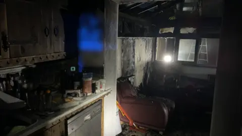 Essex County Fire and Rescue Service Image of a kitchen that has been left burnt after a fire