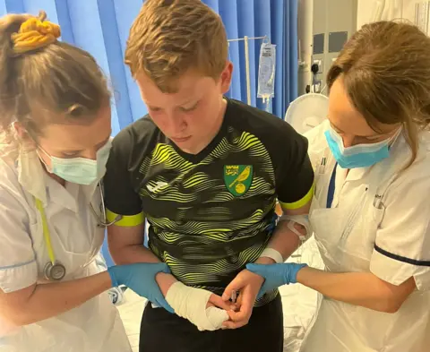 family handout Austin in hospital