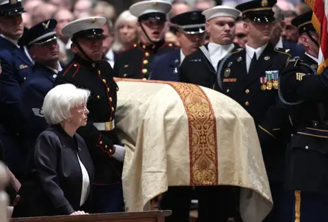 Getty Images Cheney's casket is carried in