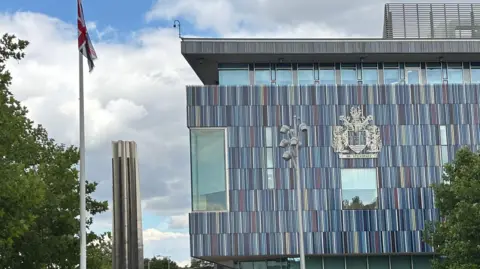 Doncaster Council offices. A large building with the city's coat of arms on the side