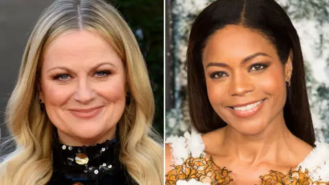 EPA Amy Poehler (left) and Naomie Harris
