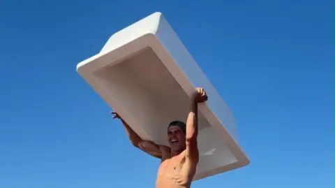 Man with bathtub