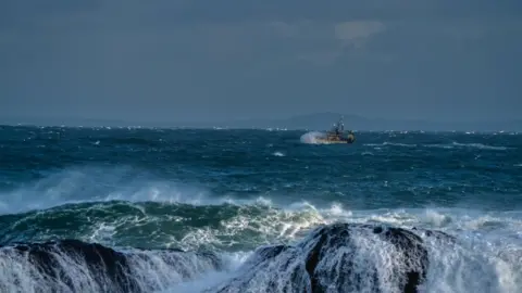 Stephen Henderson  Big waves on north coast on Thursday