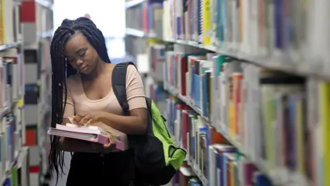 Getty Images Female student in library