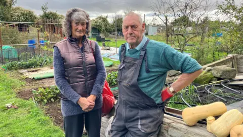 Matt Knight/BBC Susan Knowles and George Sykes-Waller pictured on an allotment site in Orsett Heath 