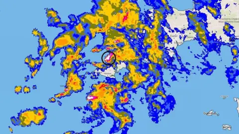 A map of the South West showing rainfall during the incident. In the affected area it is coloured pink and white, indicating very heavy rainfall.