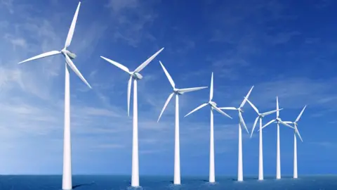 Getty Images Wind turbines on the sea