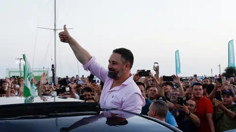 Reuters Spain's far-right Vox party leader Santiago Abascal gestures to his supporters during an opening campaign rally