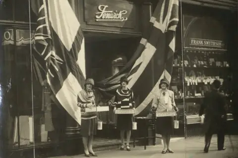 Fenwick Woman collecting on Flag Day outside the Bond Street store
