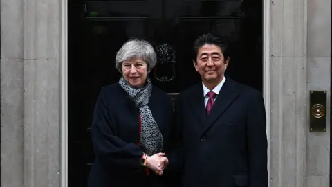 Getty Images theresa may and shinzo abe